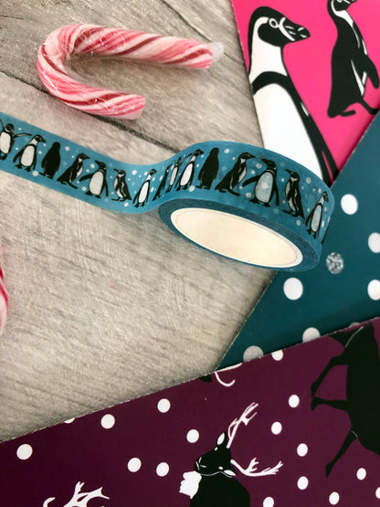 Blue washi tape with a playful, penguin print 