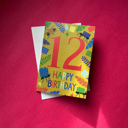 Colourful birthday card with number 12 and 'Happy Birthday' text on a red background