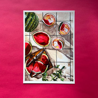 Art print of watermelons and glasses on a tiled floor with a pink background