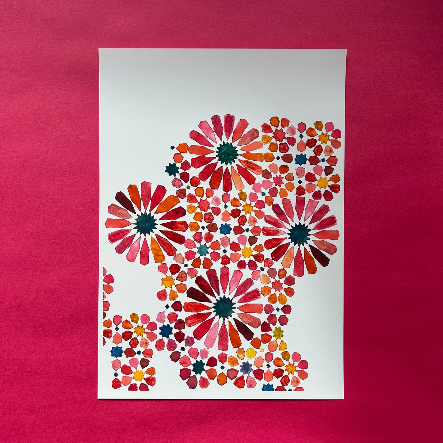 Colourful floral pattern on a white background against a red background