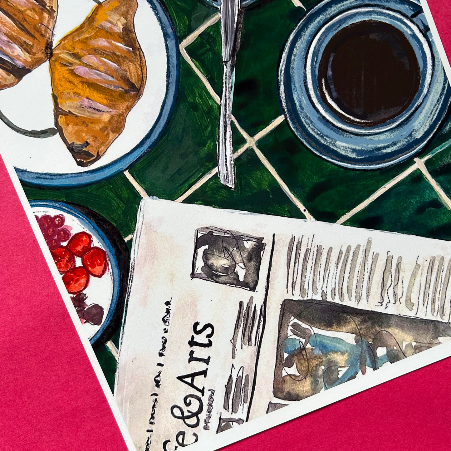 Art print of a newspaper, coffee, and pastries on a table.