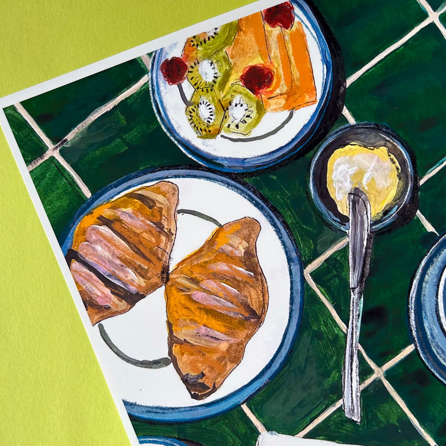 Illustration of pastries and a bowl of fruit on a green tiled surface