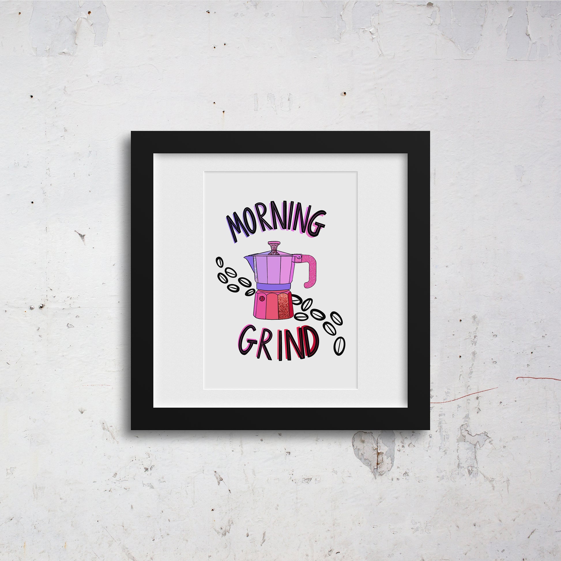 Image shows a framed illustration of a stovetop espresso maker in shades of pink and purple with ink drawn coffee beans behind it. Modern graphic lettering reads Morning Grind. 