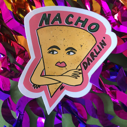 Image shows a vinyl sticker featuring an illustration of a nacho with her arms crossed and he wording 'Nacho Darlin'