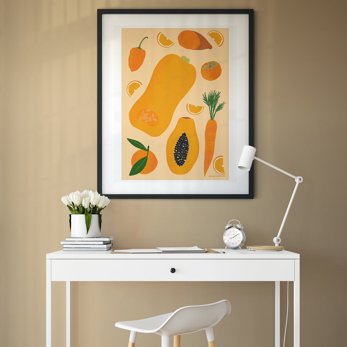 Image of a framed illustration of a selection of orange fruits and vegetables on a pale orange background.