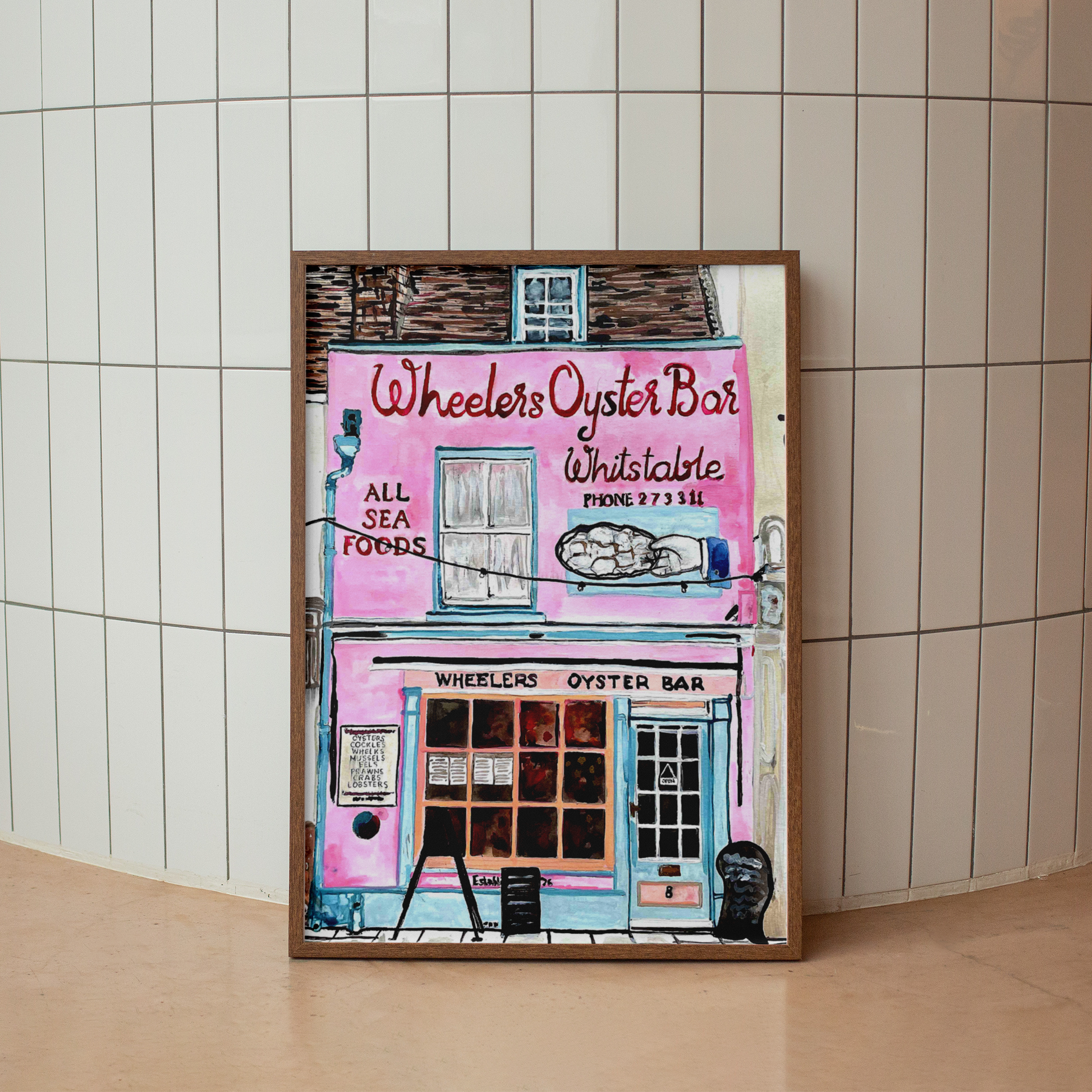 Framed artwork of Wheeler's Oyster Bar on a tiled wall.