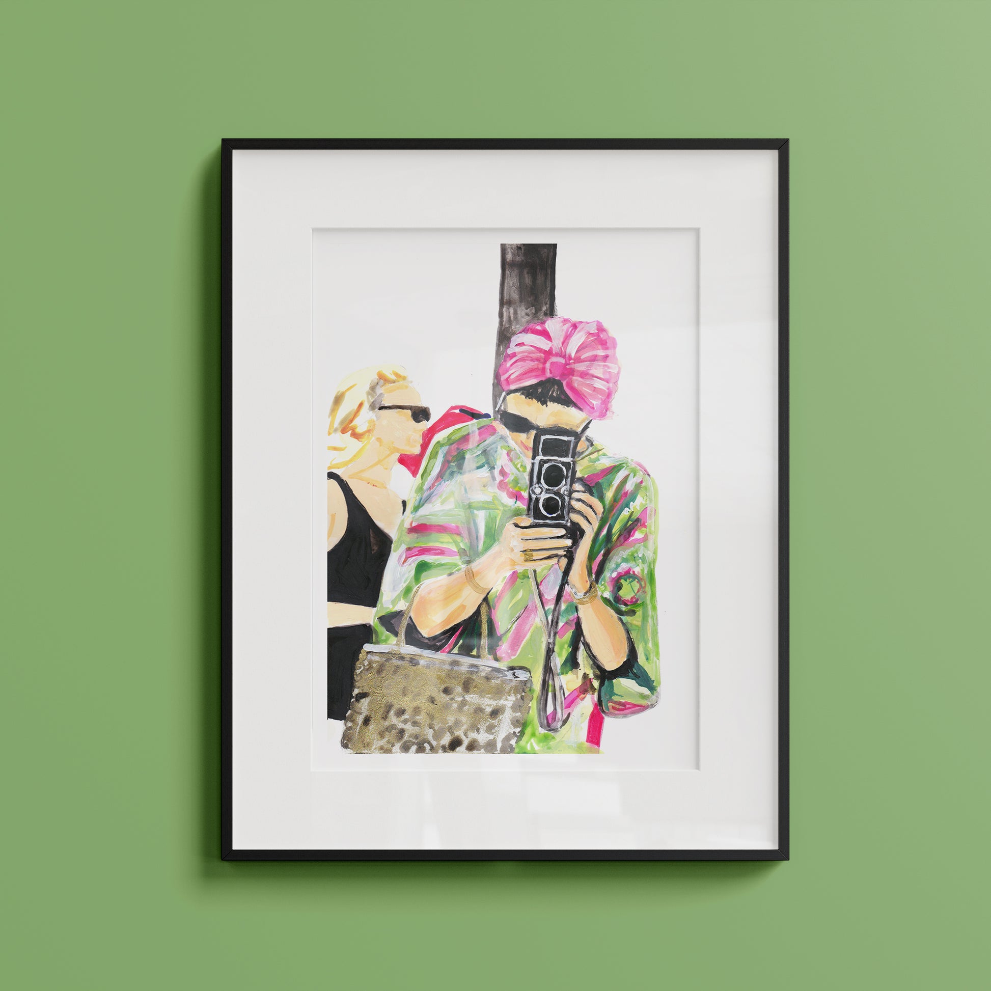 Image shows an illustration of a woman in a pink and green kaftan, black sunglasses and pink turban holding a vintage camera.