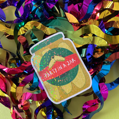 Sticker of a jar with 'Party in a Jar' text on colorful streamers