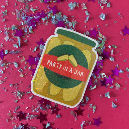 Sticker of a jar with 'Party in a Jar' text on a pink background with star-shaped confetti.