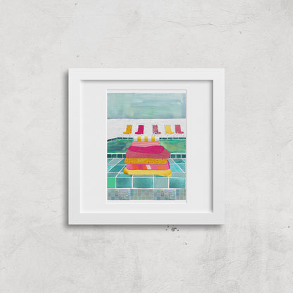 Framed illustration of a poolside featuring a stack of colourful towels and some chairs on a white background.