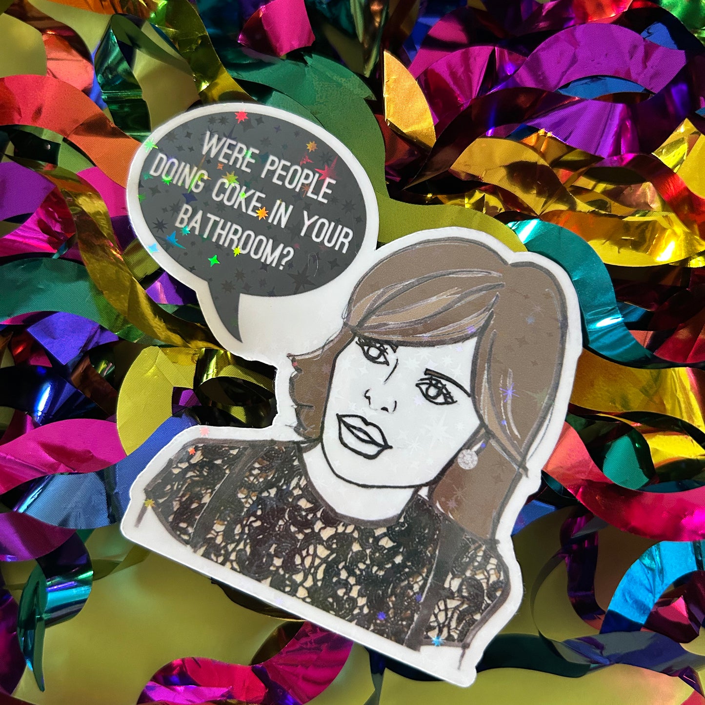 Sticker of Lisa Rinna asking 'Were people doing coke in your bathroom?' on a colourful background