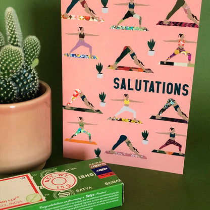 Image shows an everyday greetings card that says 'salutations' and features a fun pattern of women doing yoga poses on colourful yoga mats