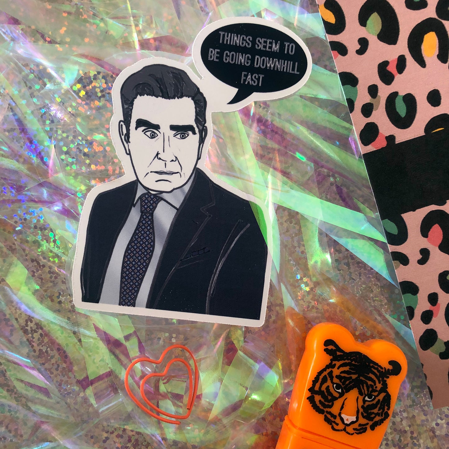 Image shows a sticker inspired by Johnny from tv series Schitt's Creek