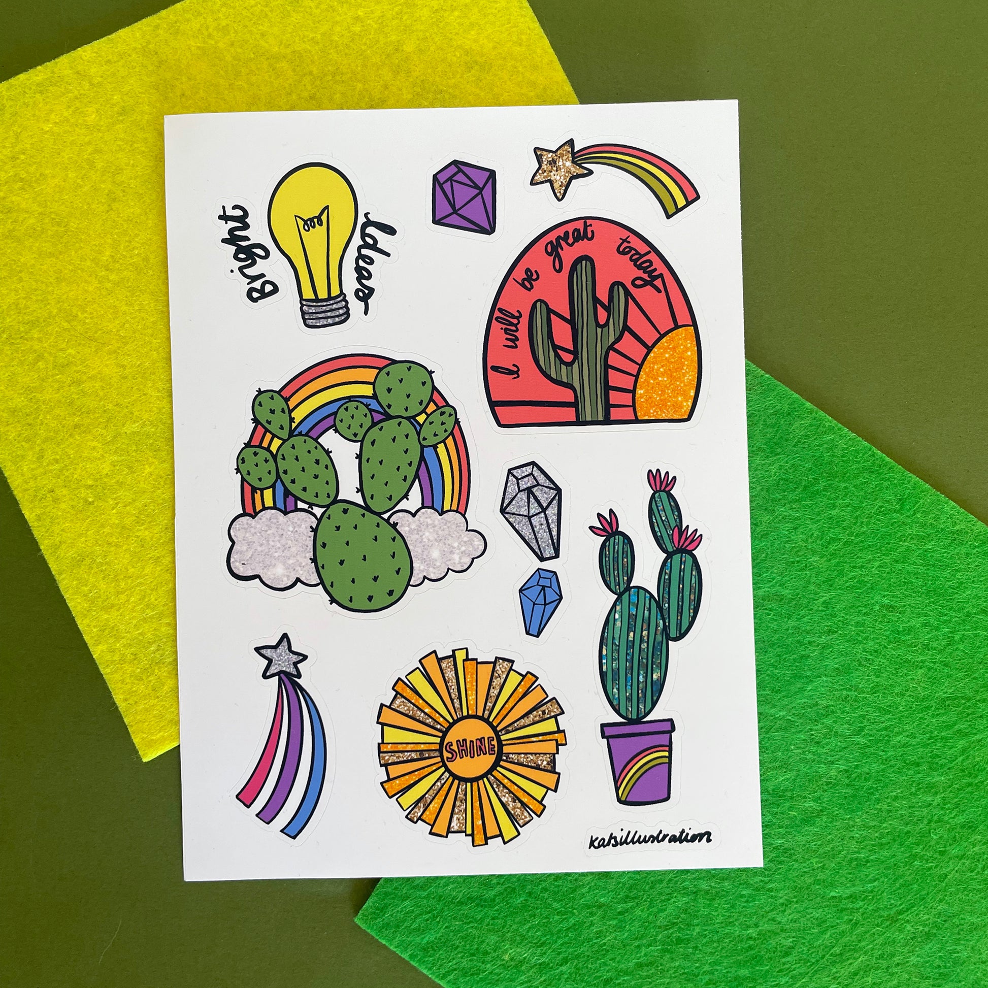 Image shows a bright  and colourful sticker sheet with illustrated designs of cacti, gems and other bright designs.