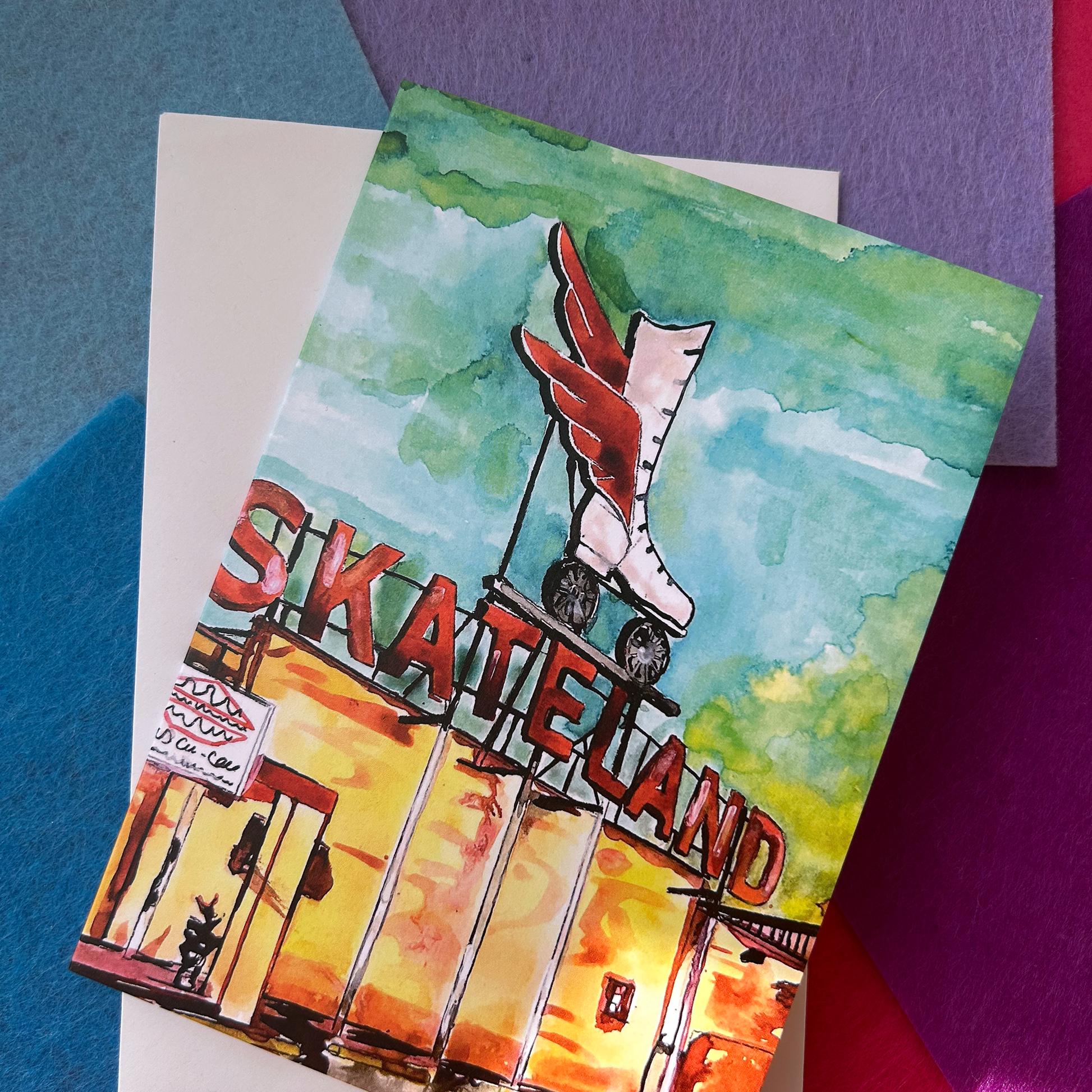 Colorful illustration of a Skateland sign with roller skates on a textured surface.