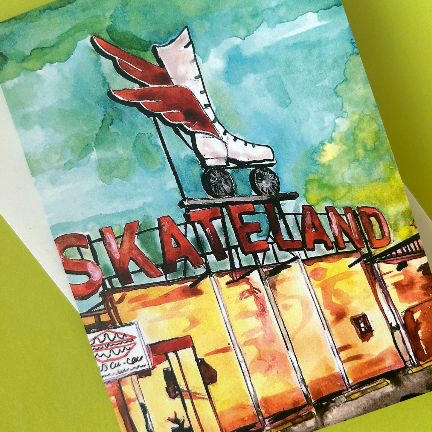 Illustration of a roller skate and 'Skate Land' sign with a watercolour background.