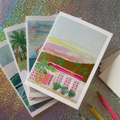 Image shows a set of 4 notecards each featuring a different, unique illustration of a summer scene