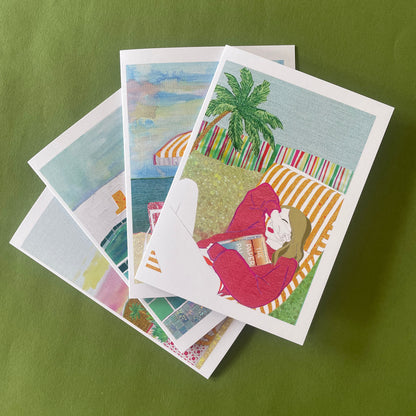 Image shows a set of 4 notecards each featuring a different, unique illustration of a summer scene