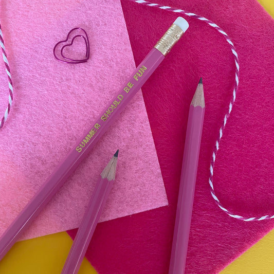 Image of a pink pencil with the words summer should be fun' embossed in gold lettering