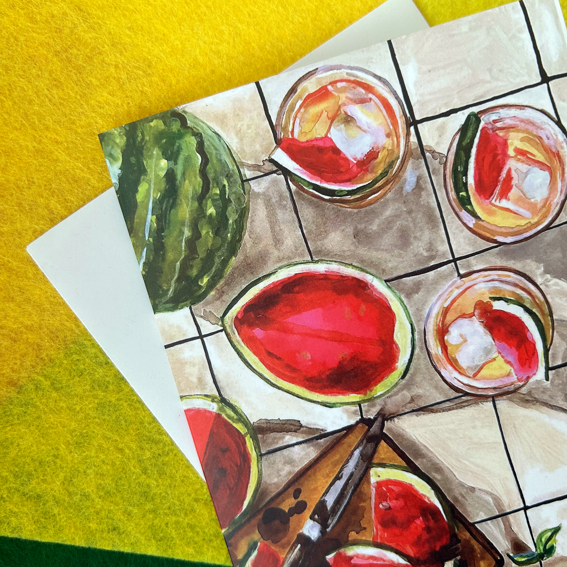 Illustration of watermelon slices and a glass of juice on a tiled surface.