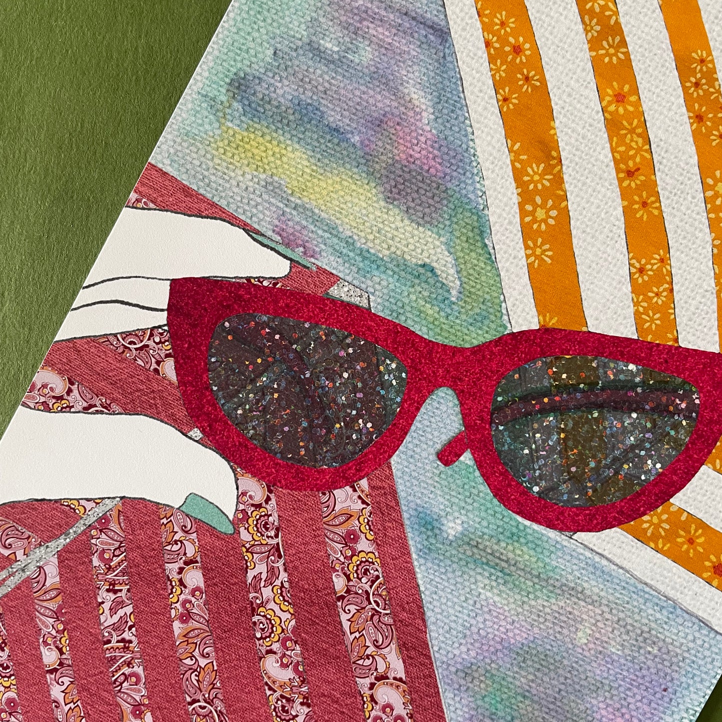 close up of an illustration of the sunlight shining through a pair of pink sunglasses 