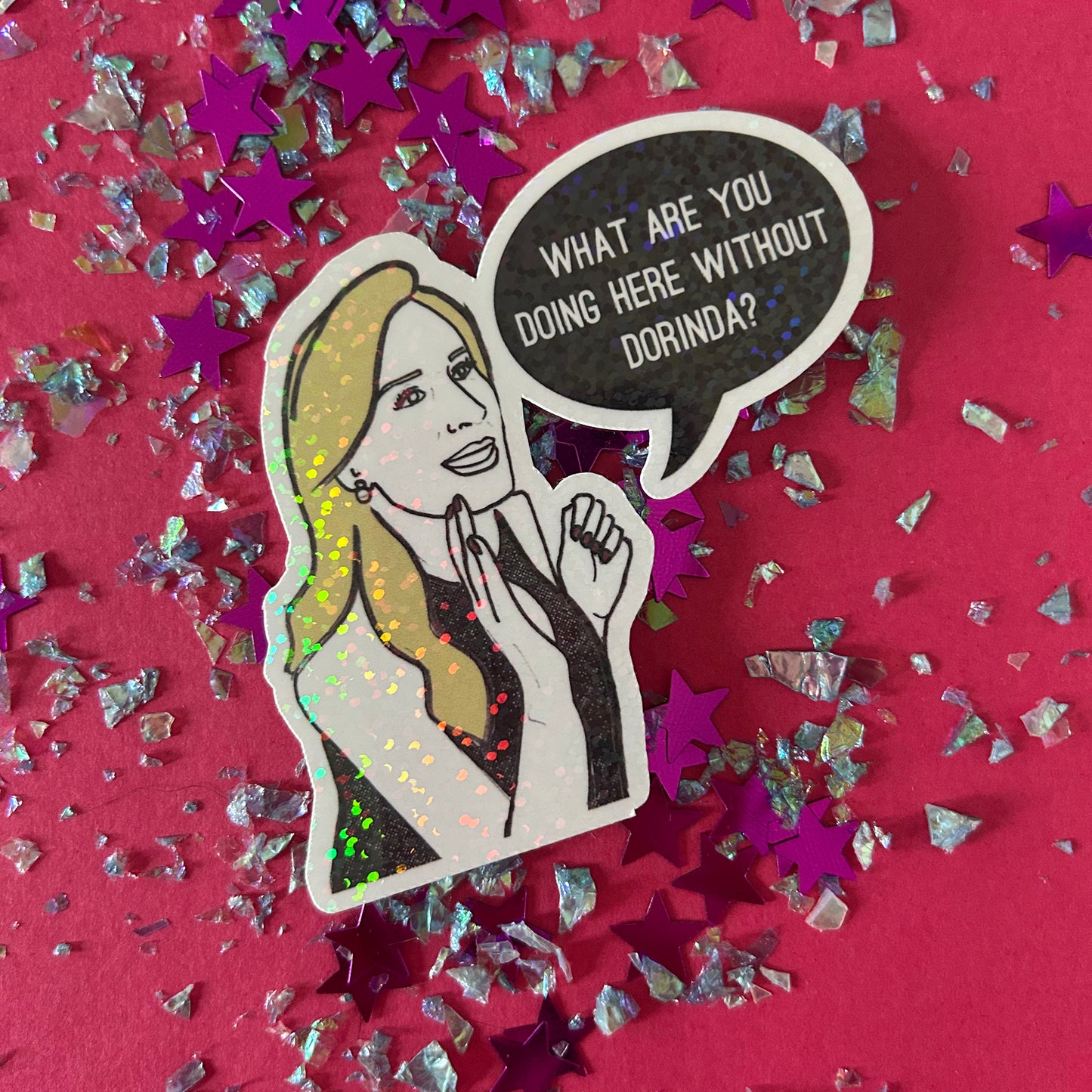 Sticker of a woman with a speech bubble asking 'What are you doing here without Dorinda?' on a pink background with stars.