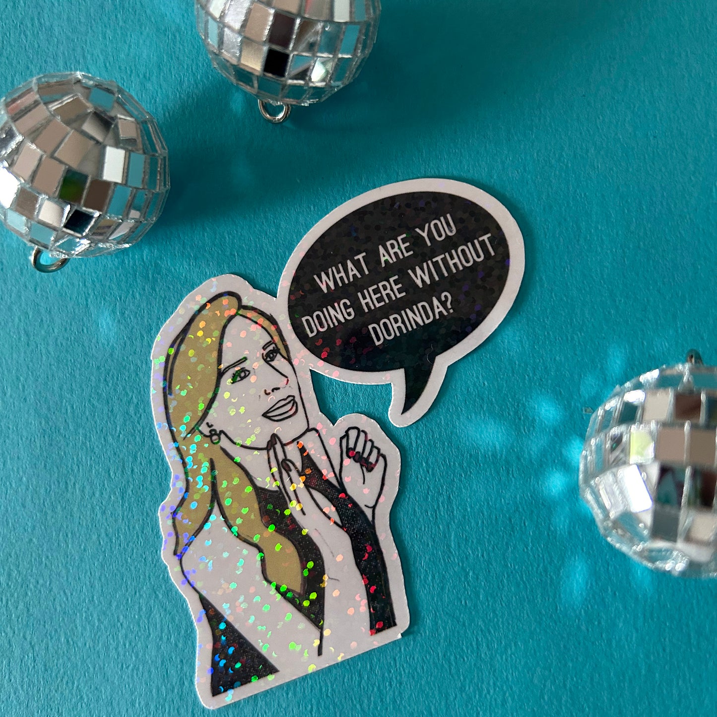 Sticker with a woman's silhouette and text bubble on a blue background with disco balls.