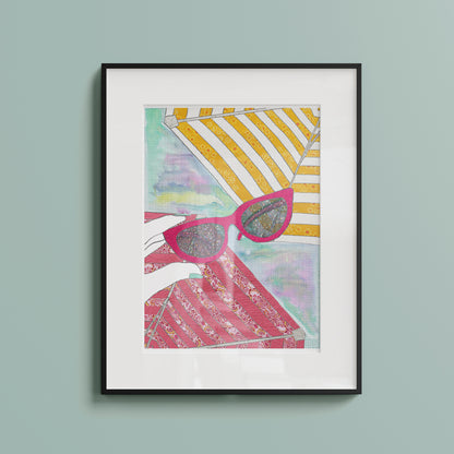 Framed illustration of the sunlight shining through a pair of pink sunglasses on a blue wall