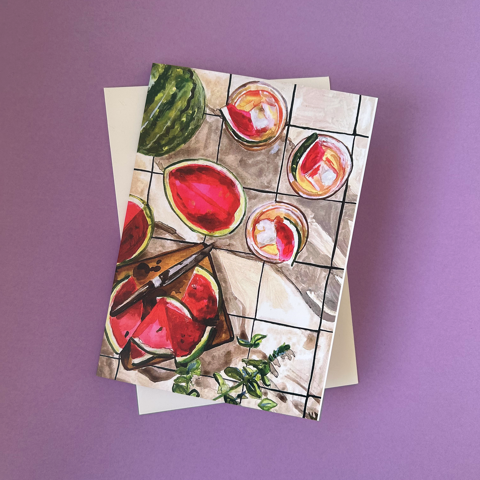 Greeting card with watermelon design on a purple background