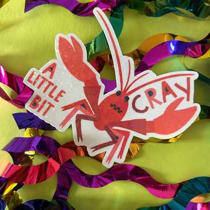 Sticker of a crayfish with 'A Little Bit Cray' text on colorful ribbons